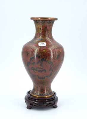 a vase that is sitting on a stand on a white surface