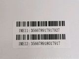 a close up of a white box with a barcode on it