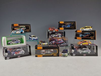 a lot of toy cars that are in a display case