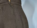 a close up of a woman ' s pants with a zipper on the side