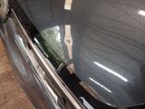 a close up of a car ' s front bumper and fender