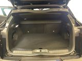 a trunk of a car with the back door open