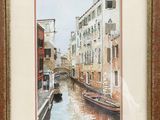 painting of a canal in venice with a boat in the foreground