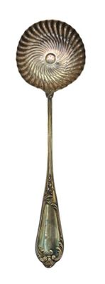 a spoon that is sitting on top of a spoon