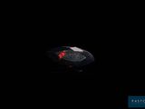 an image of a computer mouse lit up in the dark