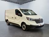 the white van is parked inside of a large white room