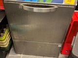 an image of a kitchen with a dishwasher and a trash can