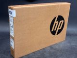 the hp logo is on the side of the box on the table