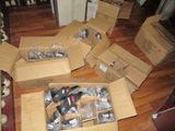 many boxes of tools sitting on the floor next to each other