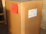 a cardboard box sitting on a pallet in a warehouse