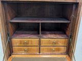 an old wooden desk with two drawers and a drawer underneath it