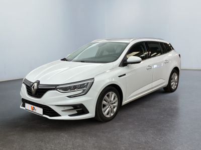 a white car is parked in a white room with a black floor