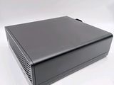 a close up of a black computer case on a white surface