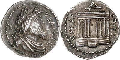 a silver coin with an image of a man in a cage on it