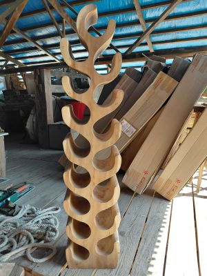 a picture of a wine rack made out of wine bottles