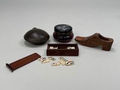 a wooden box with dice pieces and a wooden box with a wooden box with dice pieces and a wooden box with dice pieces and a wooden box with dice