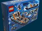 a box of legos with a picture of a boat in the water