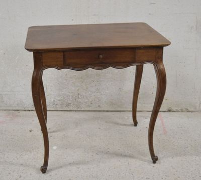 a small wooden table with a drawer on top of it