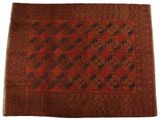 un tapis orange et noir orné d'un motif