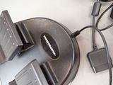 a close up of a charger and a charger on a table