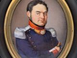portrait of a man in a military uniform in a gold frame