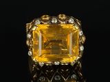 a yellow sapphire and diamond ring