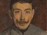 portrait of a man with a moustache in a military uniform