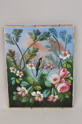 un tableau représentant un oiseau perché sur une branche d'arbre