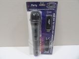 two microphones that are in a package on a table