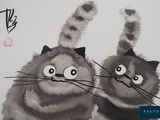 two cats that are standing next to each other