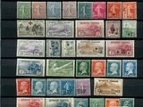 an image of a collection of stamps on display on a black surface
