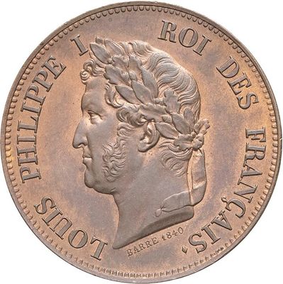 a close up of a coin with a man ' s head on it