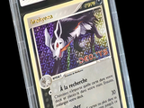 a close up of a card in a plastic case on a black background