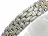 a close up of a bracelet on a white surface