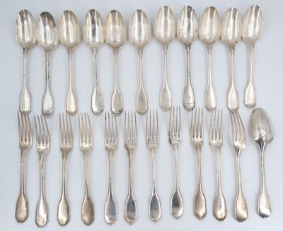 a lot of silver spoons and forks on the table