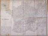 an old map of france on a wall in a room
