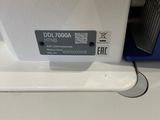 a close up of a white toilet with the lid down