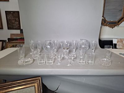 a lot of empty wine glasses sitting on a table