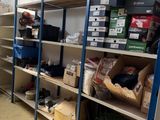 a room filled with lots of boxes and shelves