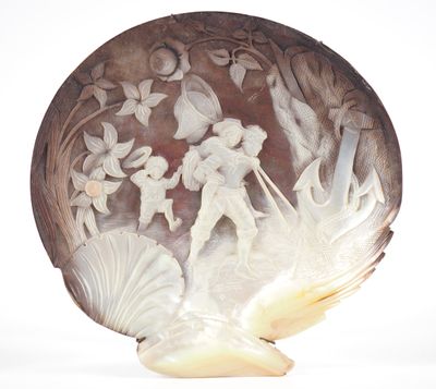 a shell with a picture of a man and a woman on it