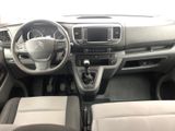 a picture of a car dashboard with a steering wheel and dashboard controls