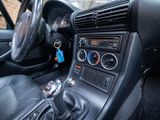 a car dashboard with a clock and a key in it