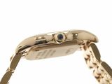 an image of a close up of a wrist watch with a chain around it