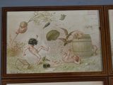 three framed pictures of children playing with toys in a room