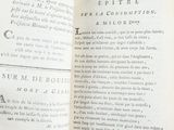 an open book with a picture of a bird on it