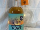 an image of a bottle of rum in front of a white background