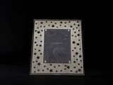 a picture of a picture frame with stars on it