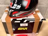 a helmet that is sitting on top of a box