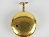 an image of a gold pocket watch on a white background