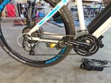 a close up of a bicycle that is parked in a garage